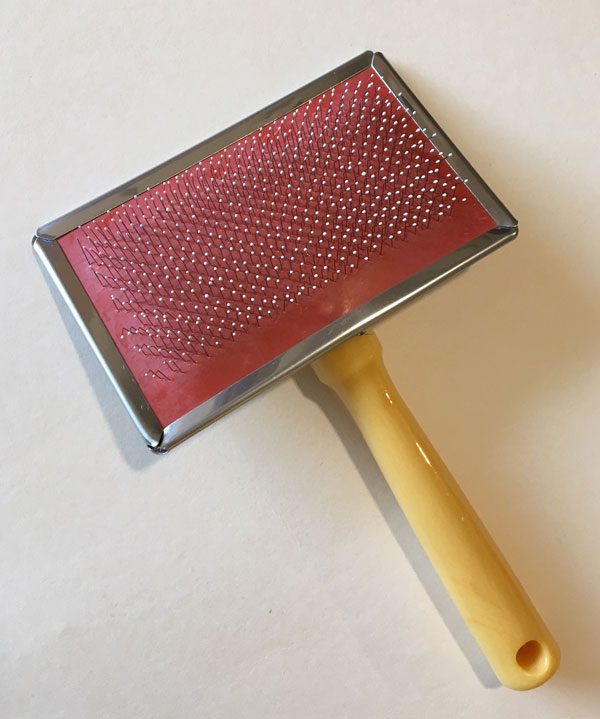 Sheepskin brush plastic handle