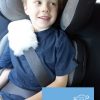 Ivory sheepskin seat belt cover on younger boy