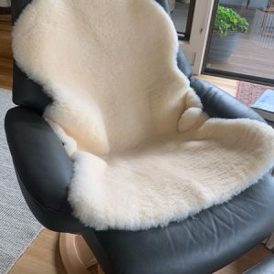 Ivory lambskin on swivel chair